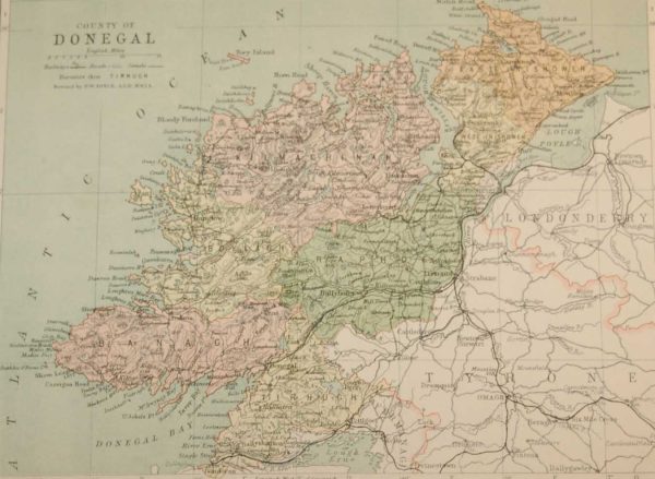 Antique map published in 1883 of County Donegal, Ireland. The map breaks the county down into it's historical baronies including East Innishowen, West Innishowen, Raphoe, Tirhugh, Banagh, Boylagh, Kilmacrenan.