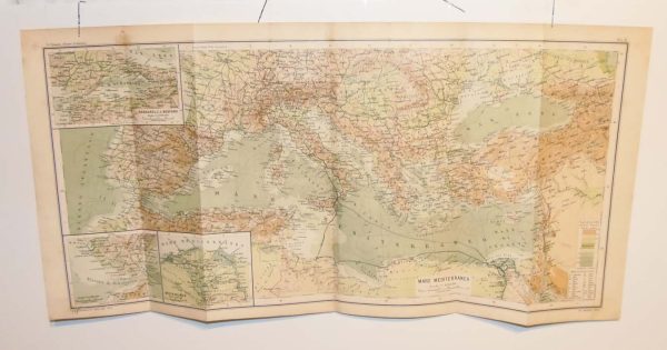 Antique colour map of the Mediterranean Sea, with smaller maps of specific areas. The map was originally printed in Italy and is titled Mare Mediterraneo.
